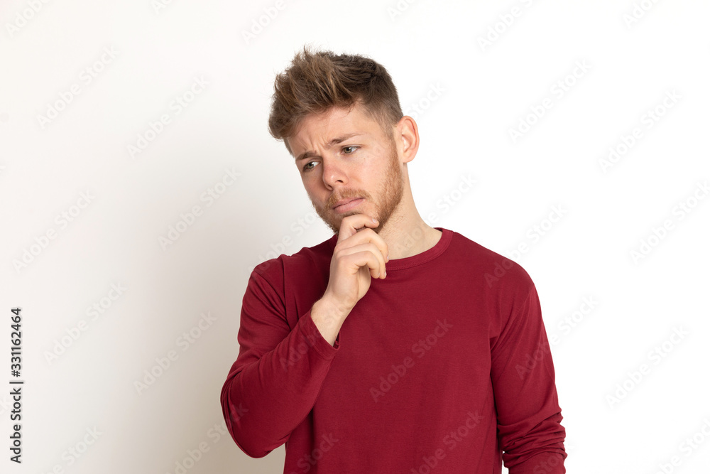 Attractive young guy with a red T-shirt Attractive young guy with a red T-shirt