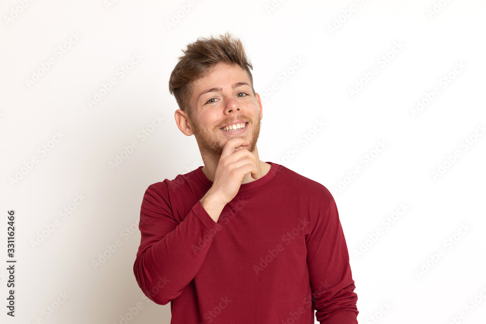 Attractive young guy with a red T-shirt Attractive young guy with a red T-shirt