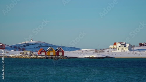 Hillesøy, Tromsø / Norway - March 4th, 2020: Colorful wooden houses on the banks of the Hillesøya Island