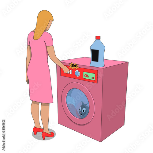 Gray cat inside the washing machine. A woman is washing clothes with a cat. The cat is trapped.