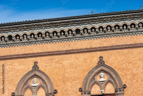 Closeup of the Palazzo Isolani. Ancient palace in Gothic and Renaissance style (1451-1455) in Piazza Santo Stefano, Bologna downtown. Emilia-Romagna, Italy, Europe photo