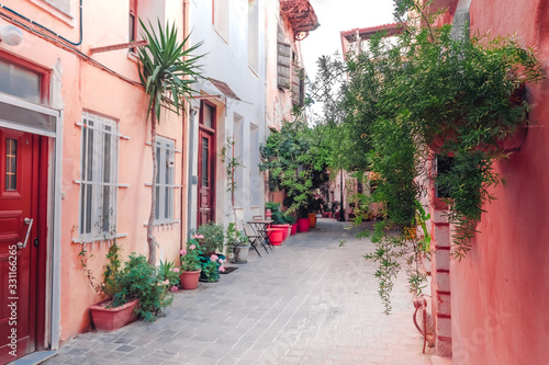 Fototapeta Naklejka Na Ścianę i Meble -  Amazing narrow streets of Crete island. Sunny morning in Greece