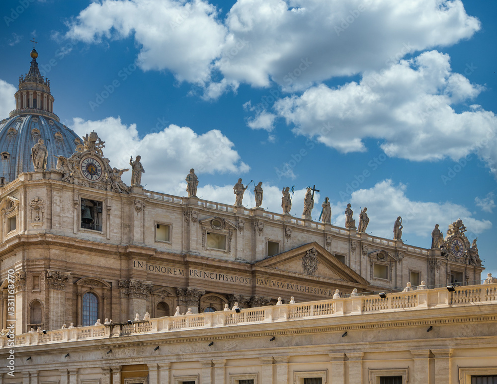 Statues of former Popes over Saint Peters Square with Basilica in background