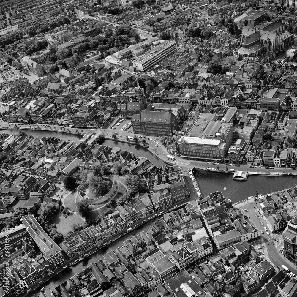 Leiden, Holland, May 30 - 1975: Historical black and white aerial photo of the center in Leiden, Holland