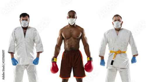 Beat the disease. Fighters and boxers in protective masks, gloves. Prevention of pneumonia respiratory symptoms such as fever, headache, cough. Chinese coronavirus. Healthcare, medicine, sport concept