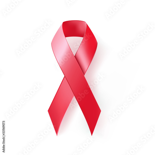 The international symbol of the fight against breast cancer, red silk ribbon on white background, vector icon. photo