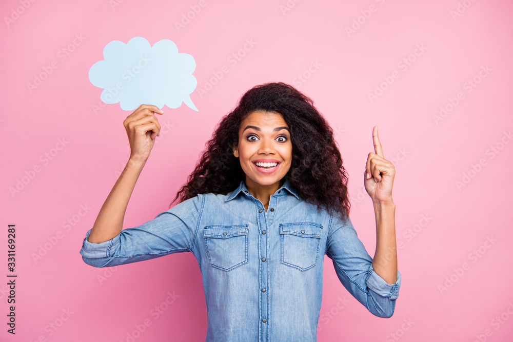 Portrait of amazed crazy afro american girl hold white paper card bubble think brain brainstroming get incredible idea scream wow omg wear denim jeans shirt isolated pink color background Portrait of amazed crazy afro american girl hold white paper card bubble think brain brainstroming get incredible idea scream wow omg wear denim jeans shirt isolated pink color background