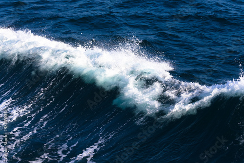 White crest of a sea wave. Selective focus. Shallow depth of field © strannik_fox
