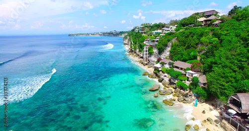 Wallpaper Mural Summer holidays at Uluwatu. Bali, Indonesia, aerial view of the ocean beach. 4K Torontodigital.ca