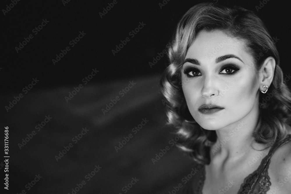 close-up Portrait of a confident beautiful business woman. The concept of gender equality. Strong independent woman. Soft selective focus. Black and white photo.