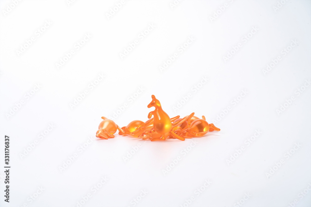 Fototapeta premium Colorful rabbits, kangaroos, pigs, and animal-shaped aromatic capsules are on a white background