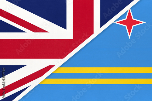 United Kingdom vs Aruba national flag from textile. Relationship between two european and american countries.