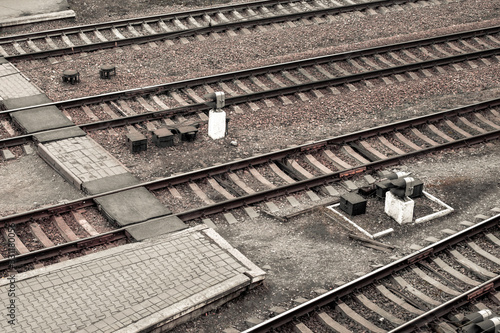 Empty railroad tracks near the train station