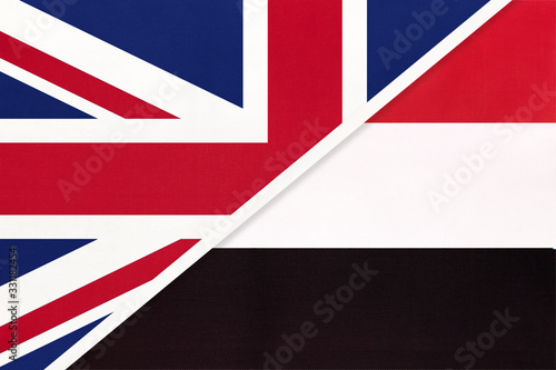 United Kingdom vs Yemen national flag from textile. Relationship between two european and asian countries.