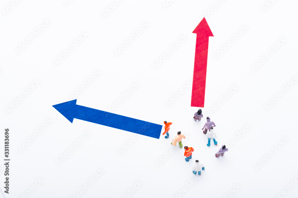 Top view of people figures near blue and red pointers isolated on white, concept of equality Top view of people figures near blue and red pointers isolated on white, concept of equality