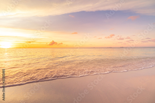 Fototapeta Naklejka Na Ścianę i Meble -  Sea sand sky concept, sunset colors clouds, horizon, horizontal background banner. Inspirational nature landscape, beautiful colors, wonderful scenery of tropical beach. Beach sunset, summer vacation