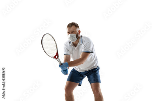 Win points off disease. Male tennis player in protective mask, gloves. Prevention against pneumonia. Still active while quarantine. Chinese coronavirus treatment. Healthcare, medicine, sport concept.