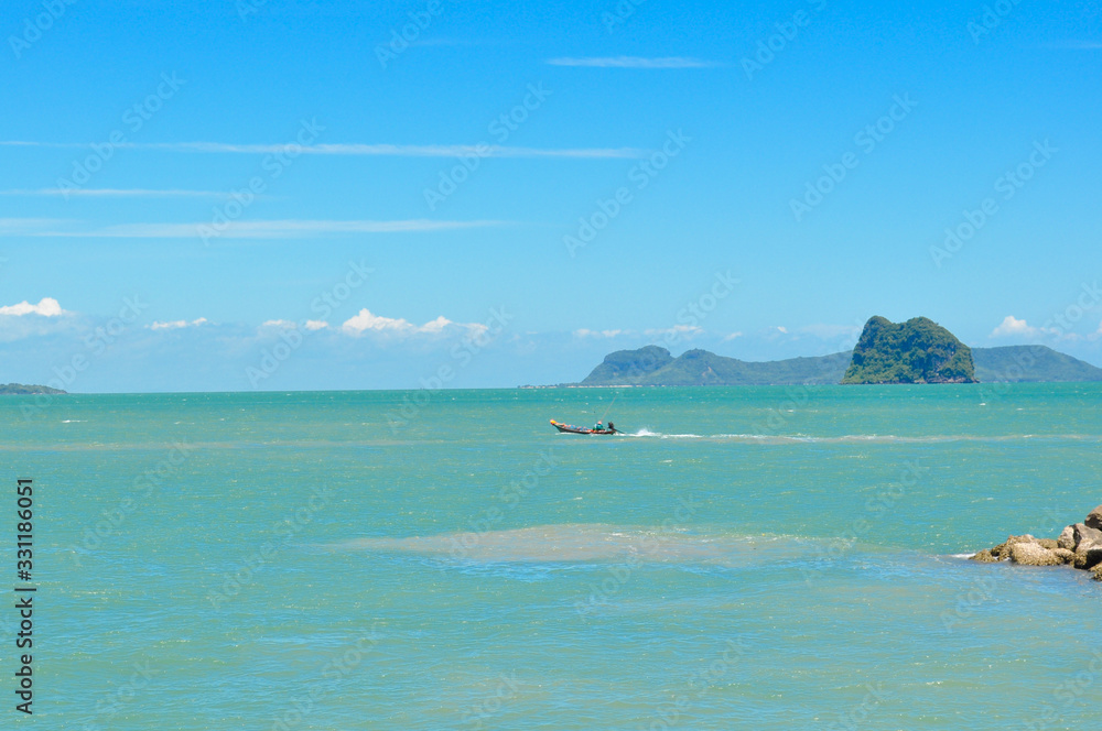 beautiful soft wave clear blue transparency sea ocean water and rocks at the bottom of the tropical paradise beach coast summer sea view at PP Island, Krabi, Phuket, Thailand.