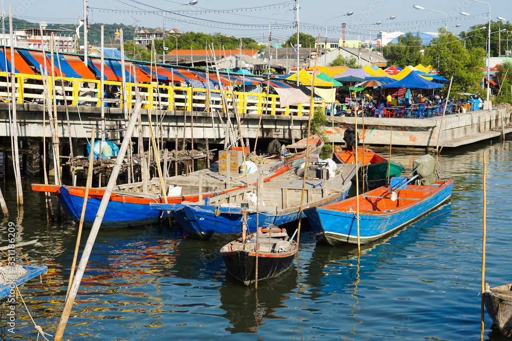 Fishing boats moored at the market