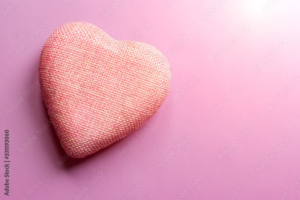 The photo shows a heart on a pink and purple background, the color of the 2020 trend. Photo shows that Valentine's day is over, love during the quarantine due to the virus. advertising space The photo shows a heart on a pink and purple background, the color of the 2020 trend. Photo shows that Valentine's day is over, love during the quarantine due to the virus. advertising space