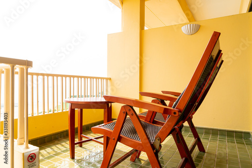 wood patio chair on balcony