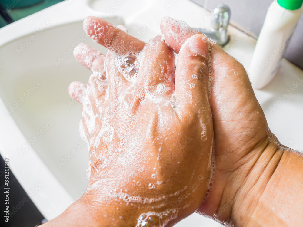 Fototapeta premium Clean hands with soap to eliminate viruses.