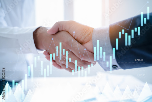 Картината върху платно Teamwork,partnership and Social connection in business join hand together,Finishing up a meeting,handshake of happy business people after contract agreement to become a partner,collaborative teamwork