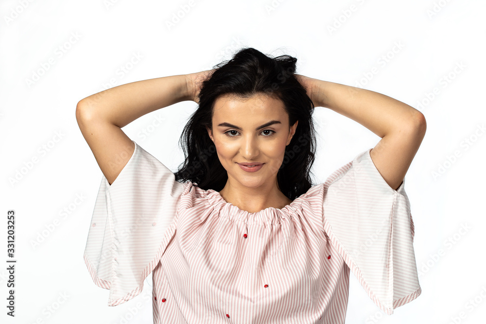 Woman holding hair Woman holding hair