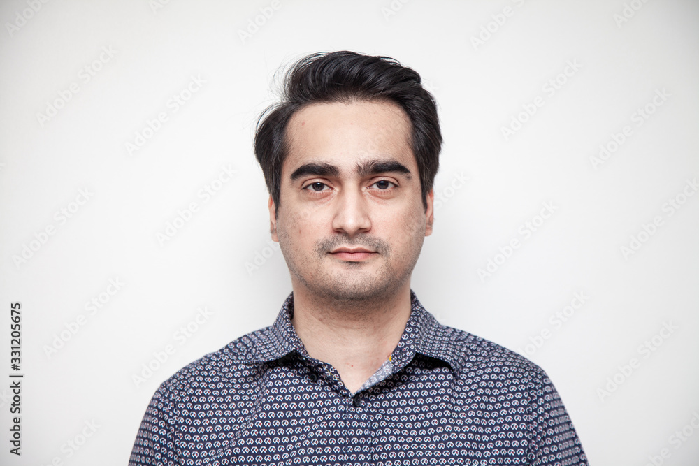 Fototapeta premium Middle East Asian man dressed casually for office work.