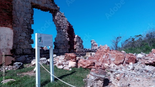 View of the crumbling facade of Borinquen Light House Ruins after Hurricanes and Earthquakes	