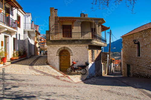 Fototapeta Naklejka Na Ścianę i Meble -  Street view of Arachova village, a popular winter destination in Parnassos mountain in Greece