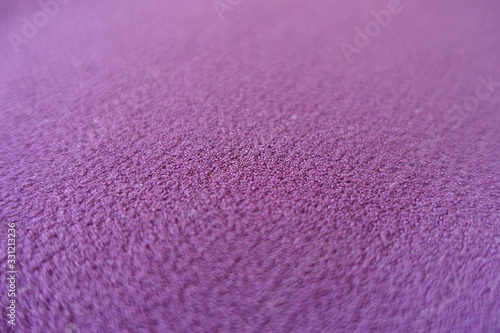 Macro of simple thick purple polyester fabric