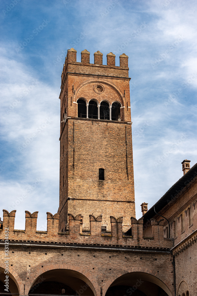 Medieval Palazzo Re Enzo (King Enzo palace, 1245) in Piazza del Nettuno and the Arengo Tower (1259) in Piazza Maggiore. Bologna downtown, Emilia-Romagna, Italy, Europe