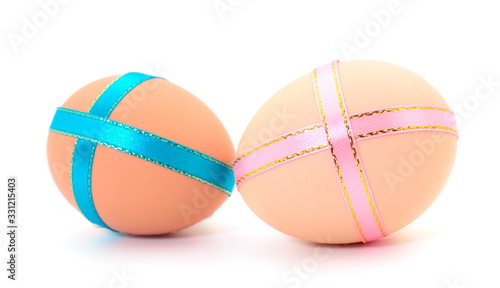 Easter eggs with festive bow isolated.