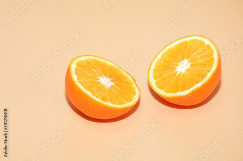 Slice of fresh orange isolated on white background