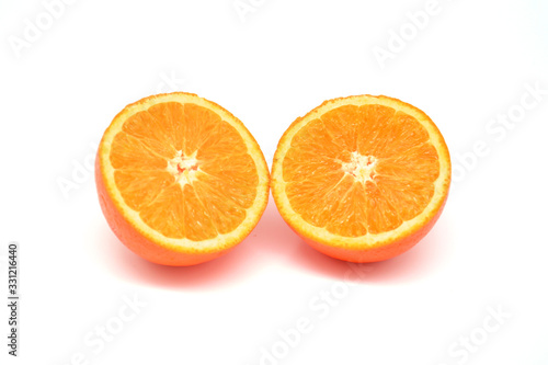 Slice of fresh orange isolated on white background