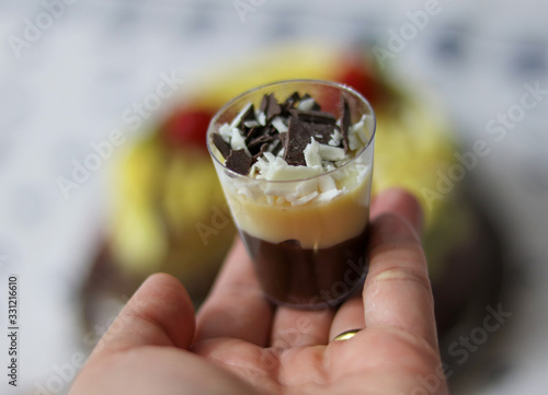 The brigadeiro with branquinho in the cup is a typical sweet of Brazilian cuisine, common in birthday parties. photo