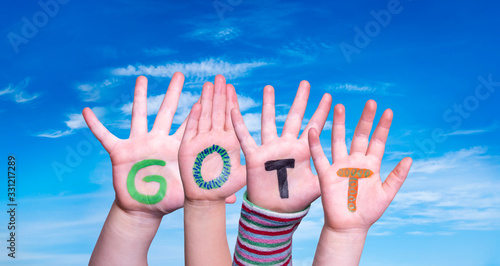 Tablou pe pânză Children Hands Building Colorful German Word Gott Means God