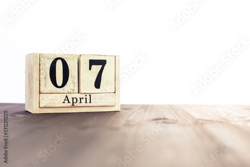 April 7th, fourth month of the clendar - copy space for text next to April symbol