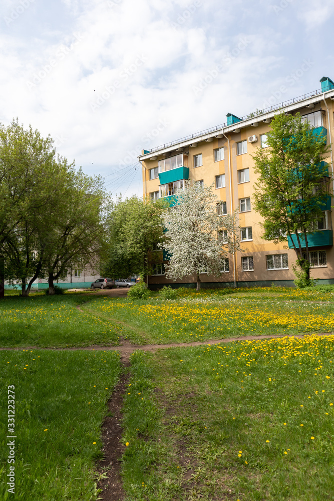 old Khrushchyovka house in spring