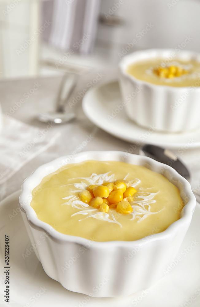 Delicious corn cream soup served on table Delicious corn cream soup served on table