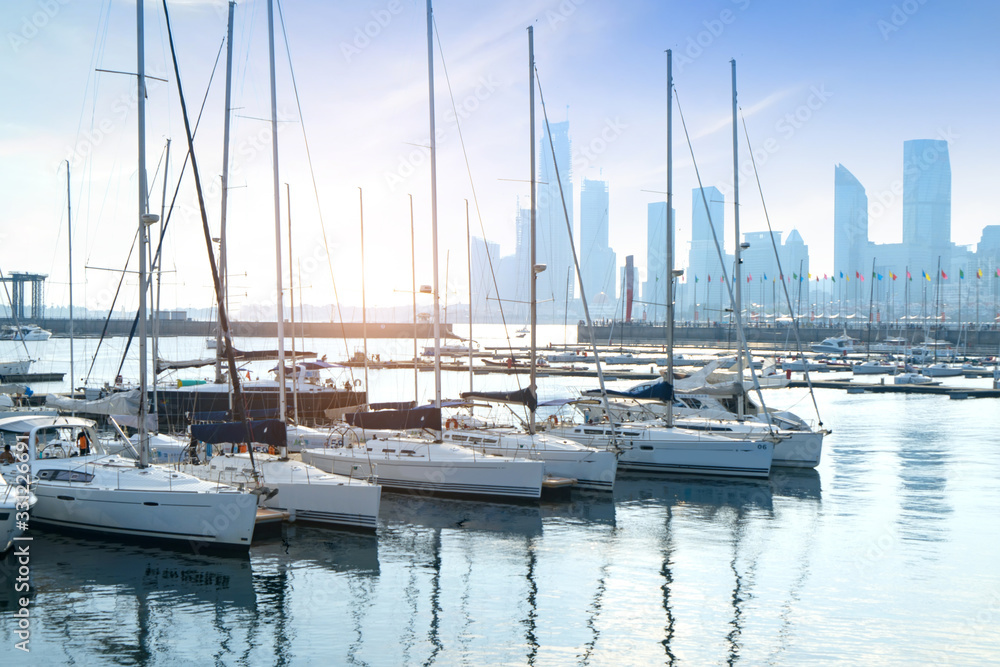 Fototapeta premium Sailing boats dock at the Olympic Sailing Center Pier in Qingdao, China