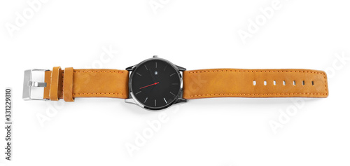 Valokuvatapetti Elegant wristwatch with leather band isolated on white, top view