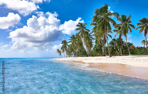 Tropical island. Desert island. Pure white sand. View of the beach from the water.