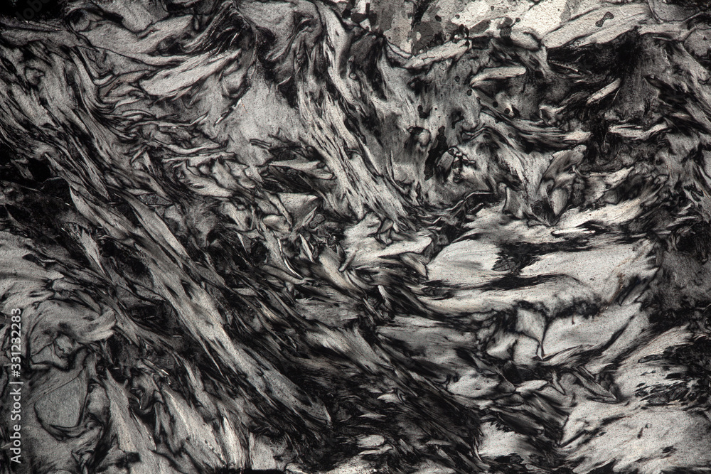 Thin section of charoite rock Thin section of charoite rock