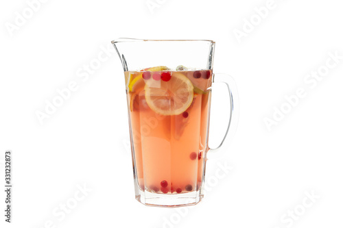 Glass jug of lemonade isolated on white background
