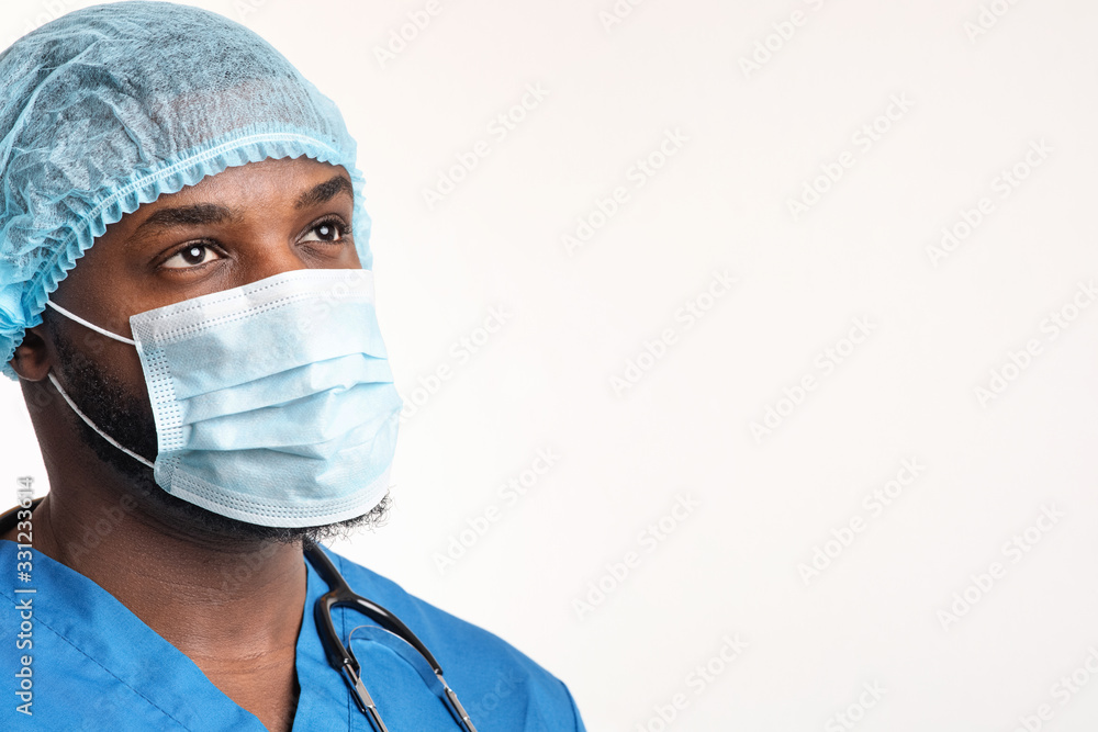 Young black male nurse looking at copy space Young black male nurse looking at copy space