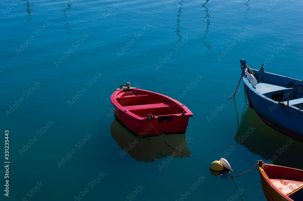 Boat moored on calm water