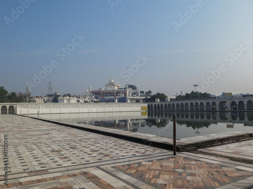 The sacred pond (Sarovar) of Anandpur Sahib, and Takhat Sri Kesgarh Sahib gurudwara in the back photo