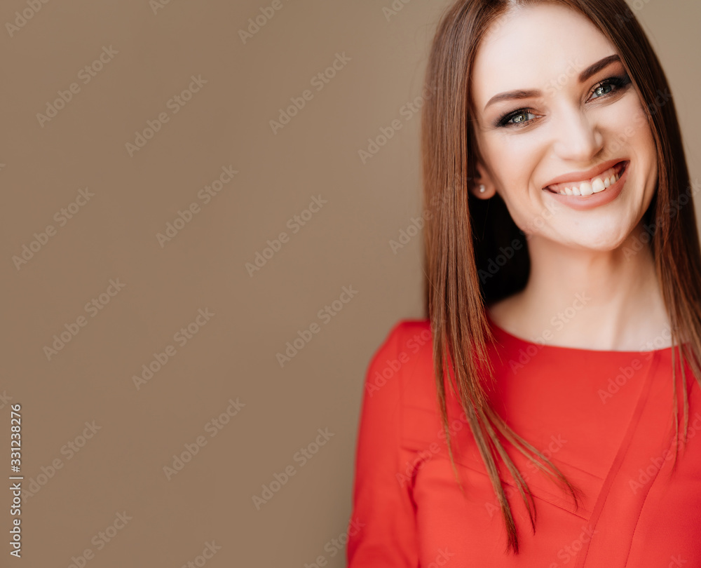 beautiful girl long hair in red laughs close-up beautiful girl long hair in red laughs close-up